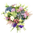 Evoking the spirit of South Wimbledon's leafy avenues, this exuberant hand-tied bouquet balances romance with whimsical artistry. Against a clean white background, clusters of deeply saturated indigo and teal hydrangeas provide a show-stopping anchor, reminiscent of serene watercolours seen along the River Wandle. Spiralling lilac and creamy roses unfurl with delicate charm, nestled among fluffy white ranunculus that bring gentle waves of softness and subtle fragrance to the arrangement. Pale yellow lisianthus buds and half-open blooms peek playfully through, their slender stems suggesting newfound hope at the start of spring mornings in Merton Hall Park. Wisps of feathery pink astilbe and sprays of vivid fuchsia-pink blossoms swirl along the rim, introducing movement and an effervescent joy. Lacy touches of pale filler flowers intertwine with lush dark green leaves to add depth and a sense of breathability. The whole assembly is elegantly brought together with a sweeping royal purple satin ribbon, its satiny finish glistening in natural light. Designed with thoughtful intention by the local florists of South Wimbledon, this bouquet radiates luxury and heartfelt warmth, perfectly suited to convey admiration, celebrate cherished milestones, or simply add beauty and grace to everyday living. Available for same-day delivery to homes, celebrations, and workplaces throughout the local SW19 community.